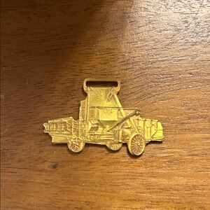 Gold Tone Holt Tractor Brooch